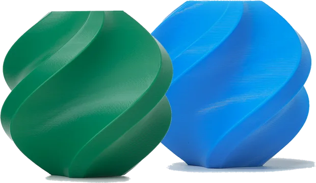 Rollos de filamento PLA verde y azul